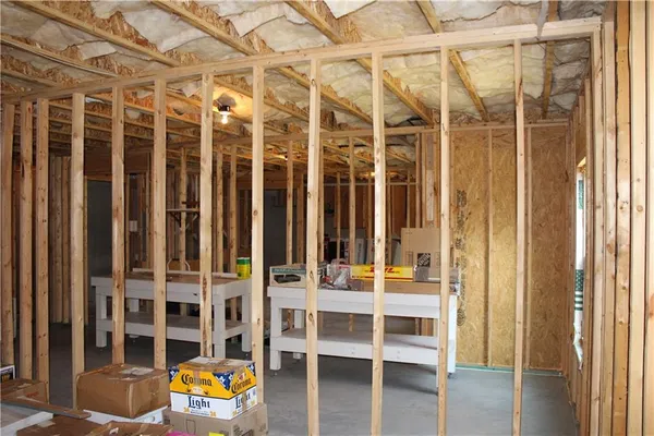 a view of a yard covered in snow