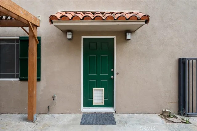 a kitchen with sink cabinets and window