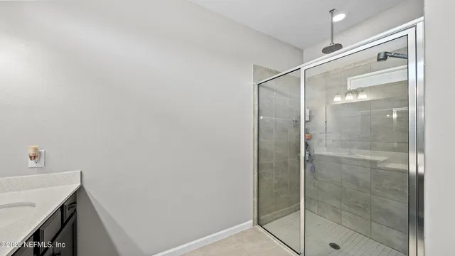a view of a house with swimming pool and porch with furniture