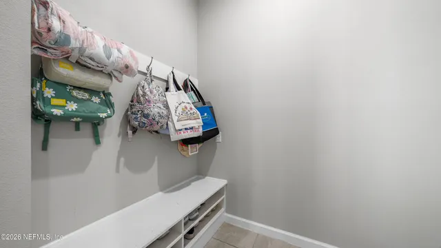a view of entryway with wooden floor