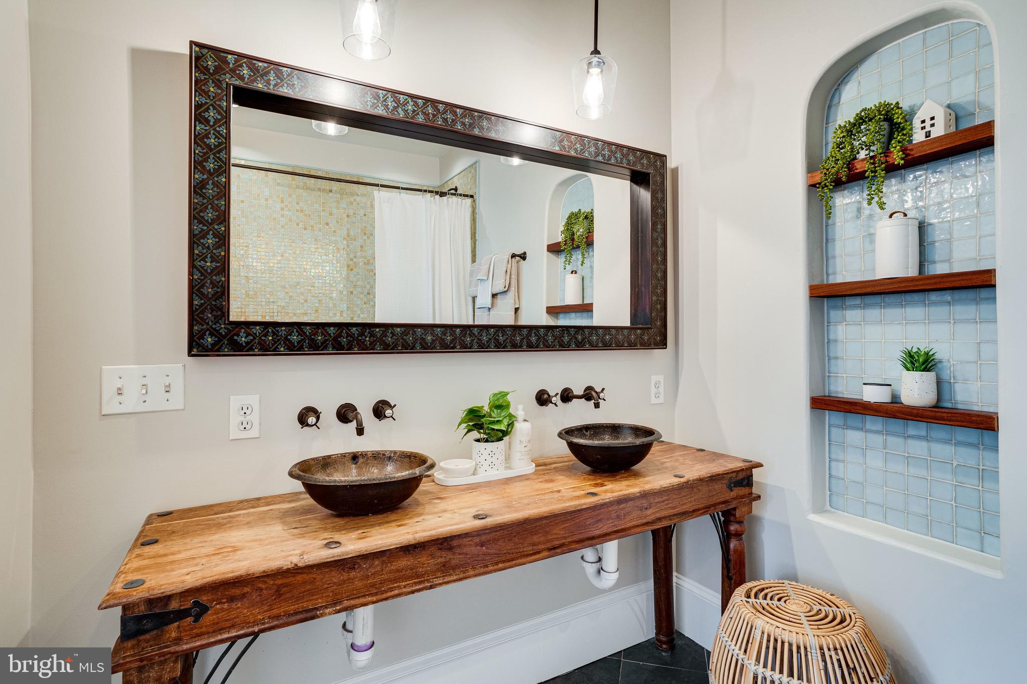 405 K Street Northeast Washington, DC 20002 - Photo 28 of 58 Custom hammered-copper double sinks in ensuite BA