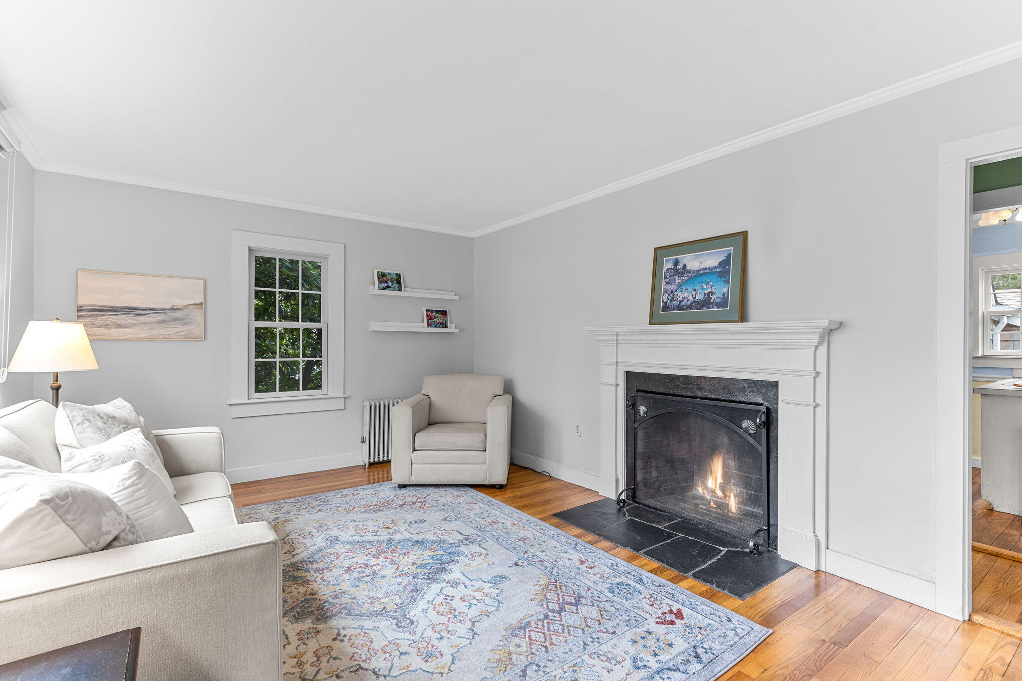 123 Tower Hill Road Osterville, MA 02655 - Photo 5 of 38 a living room with furniture and a fireplace