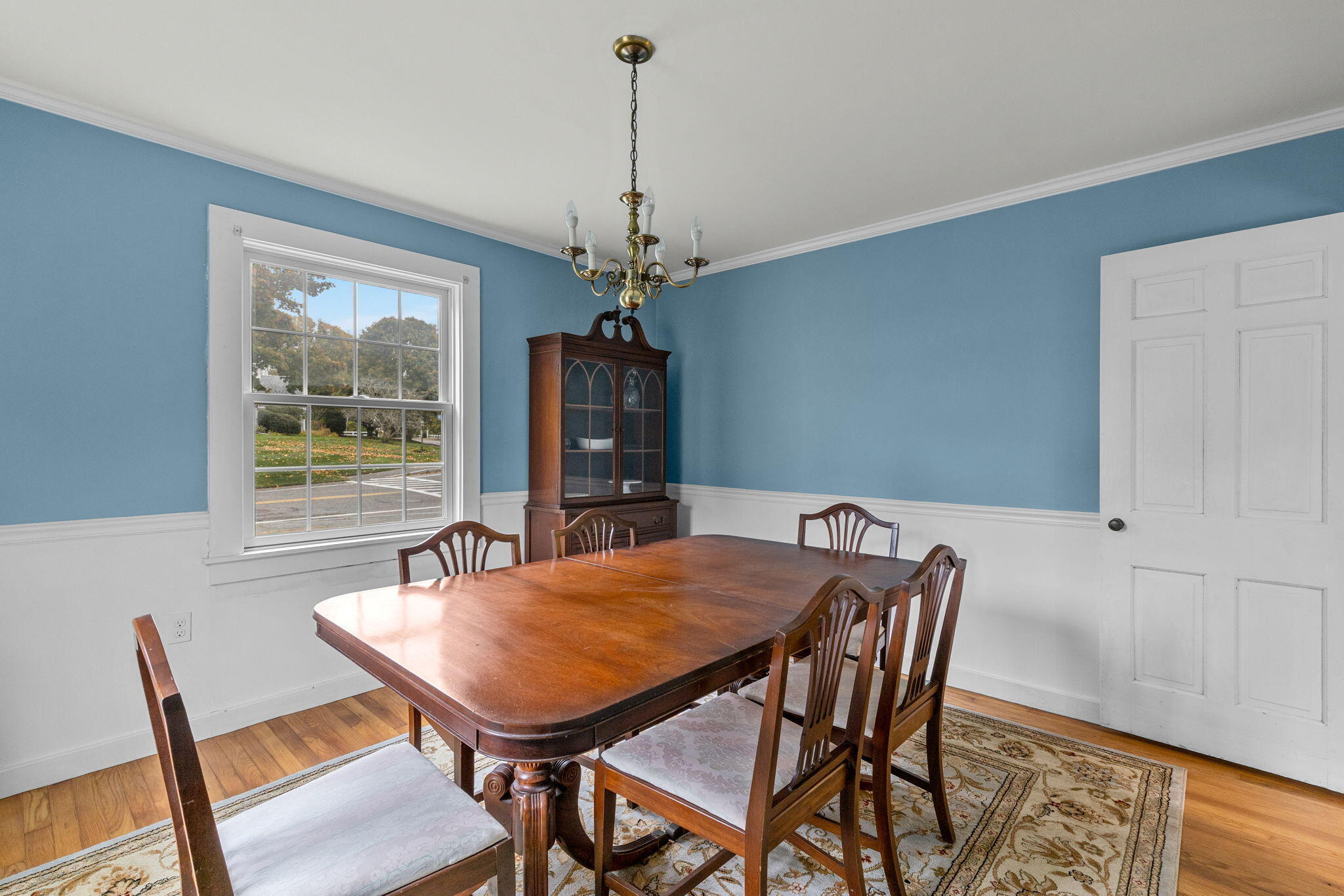 123 Tower Hill Road Osterville, MA 02655 - Photo 9 of 38 a view of a dining room with furniture window and wooden floor
