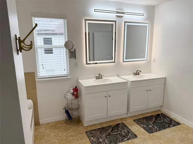 a bathroom with a toilet a sink and a bathtub