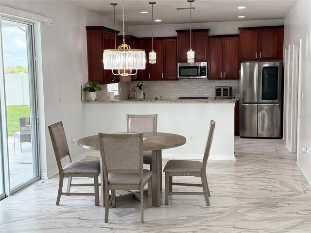 a view of a livingroom with a flat screen tv