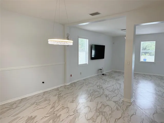 a bathroom with a toilet a sink and a mirror