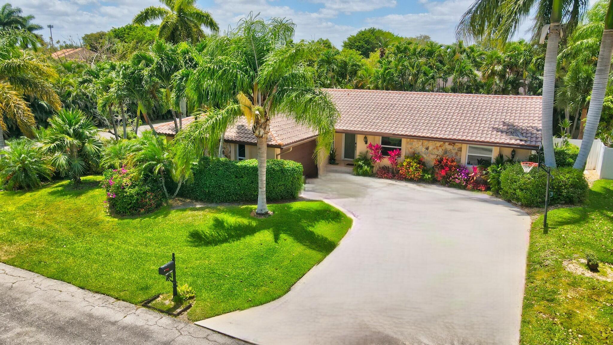 22740 Bella Rita Circle Boca Raton, FL 33433 - Photo 1 of 50 a aerial view of a house