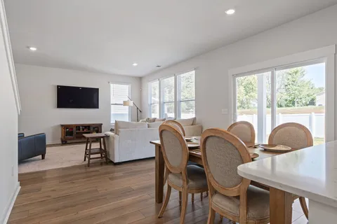 a bedroom with bed and window