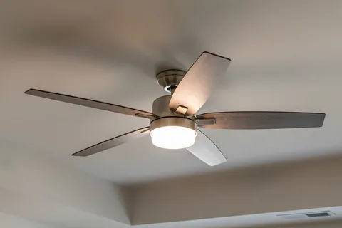 a view of a house with backyard porch and sitting area