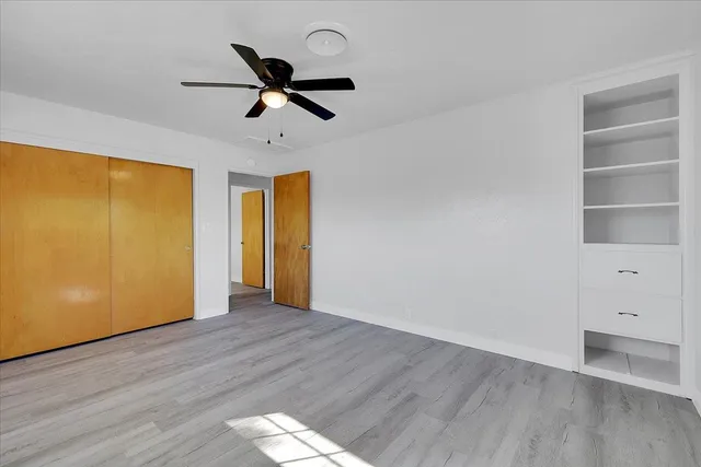 a kitchen with stainless steel appliances a refrigerator sink and cabinets