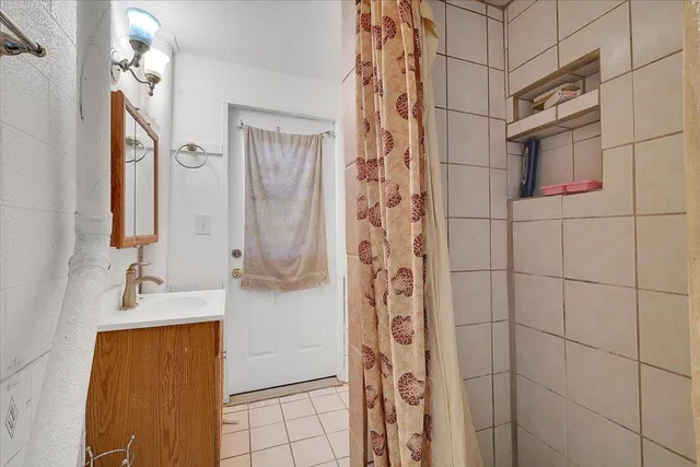 a bathroom with a sink and toilet