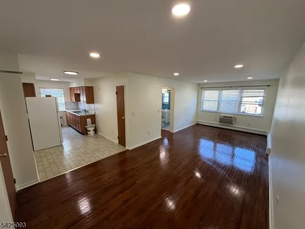 a view of a living room and dining room