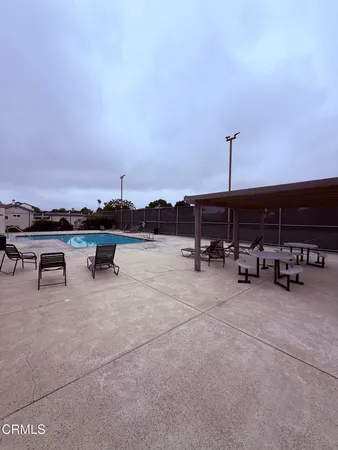 a view of a terrace with sitting area