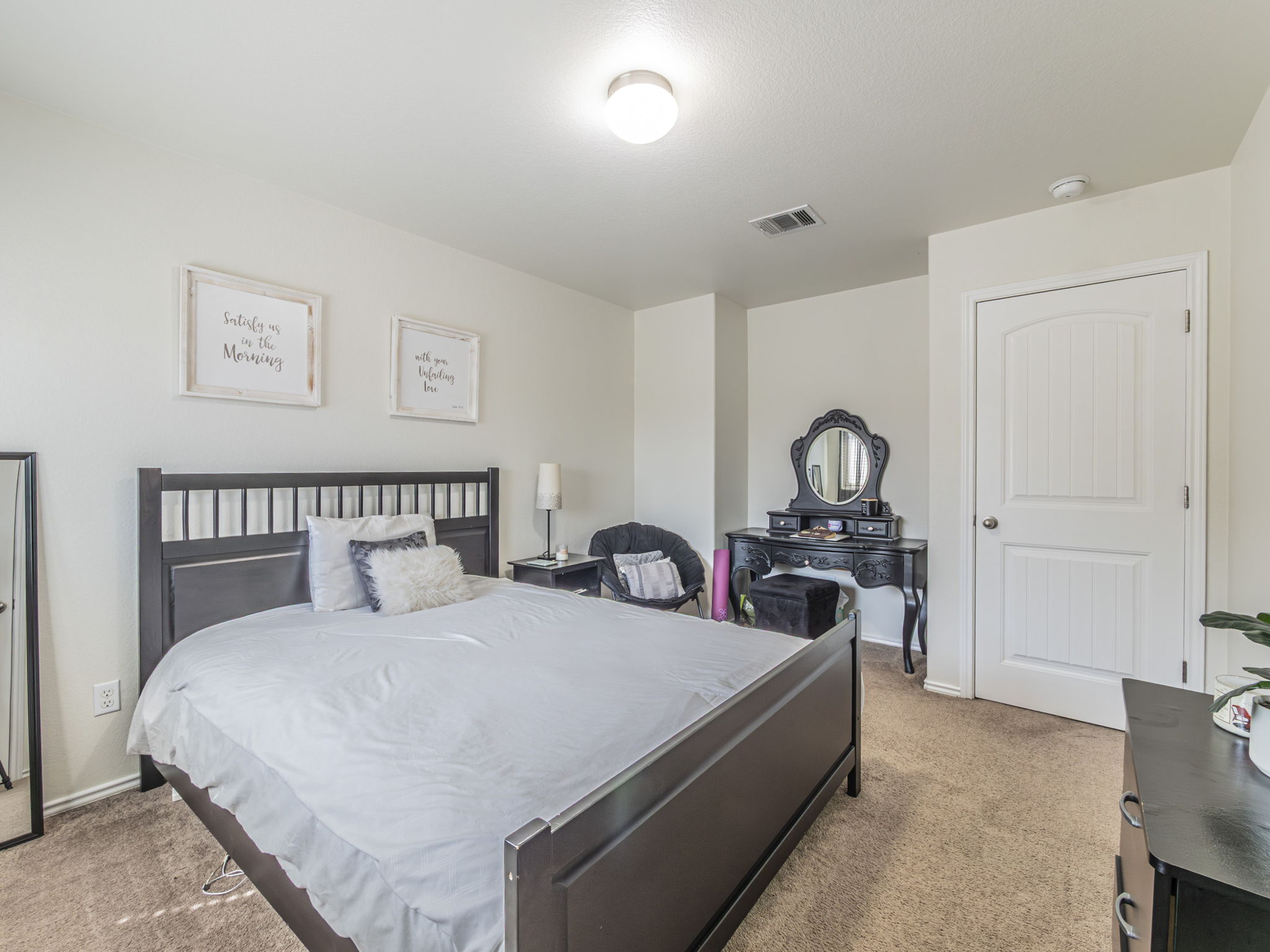 1366 Heep Run Buda, TX 78610 - Photo 24 of 35 Bedroom with light carpet and baseboards