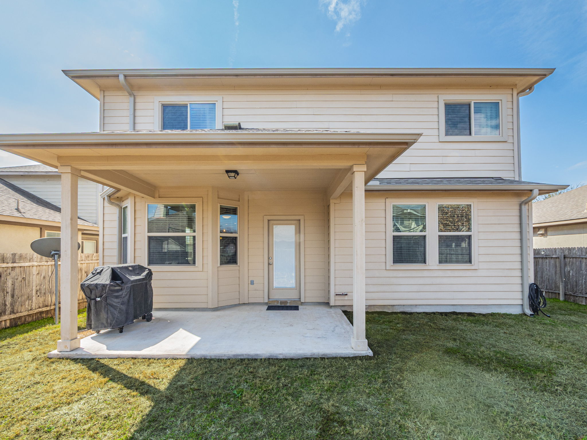 1366 Heep Run Buda, TX 78610 - Photo 30 of 35 Back of property featuring a patio and a fenced backyard
