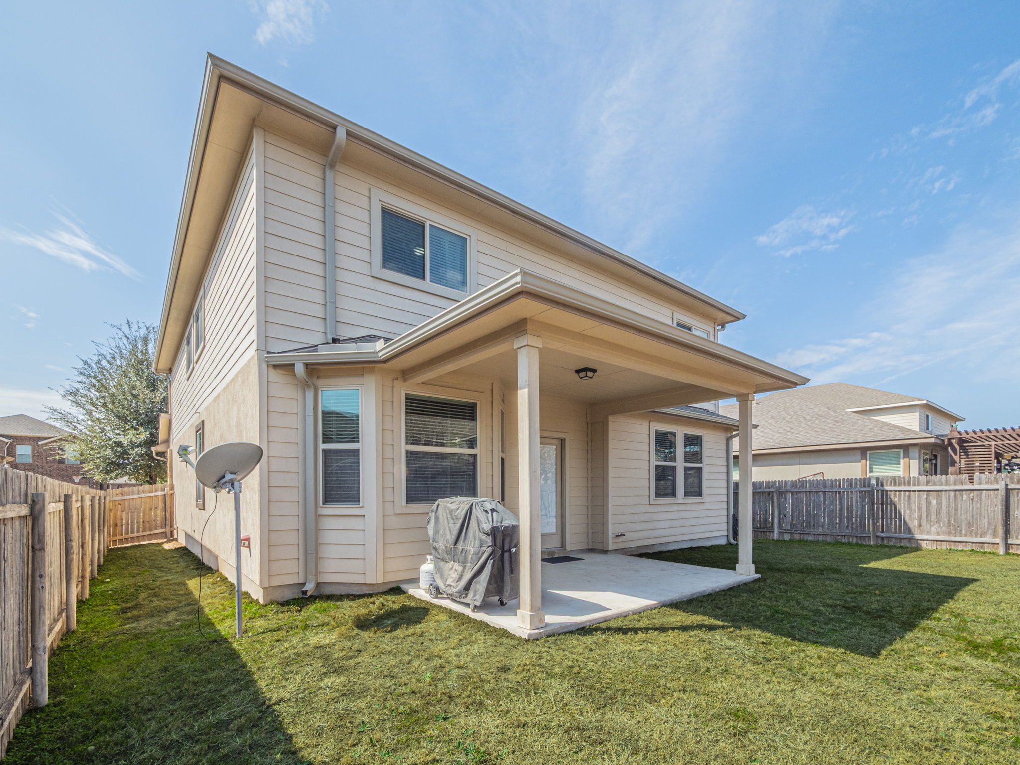 1366 Heep Run Buda, TX 78610 - Photo 31 of 35 Back of house with a patio area and a fenced backyard