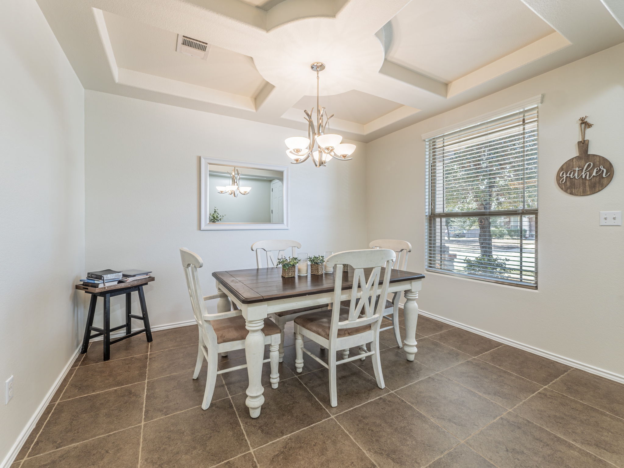 1366 Heep Run Buda, TX 78610 - Photo 8 of 35 Dining space featuring coffered ceiling, suspended lighting. This dining room is at the entrance to the property.