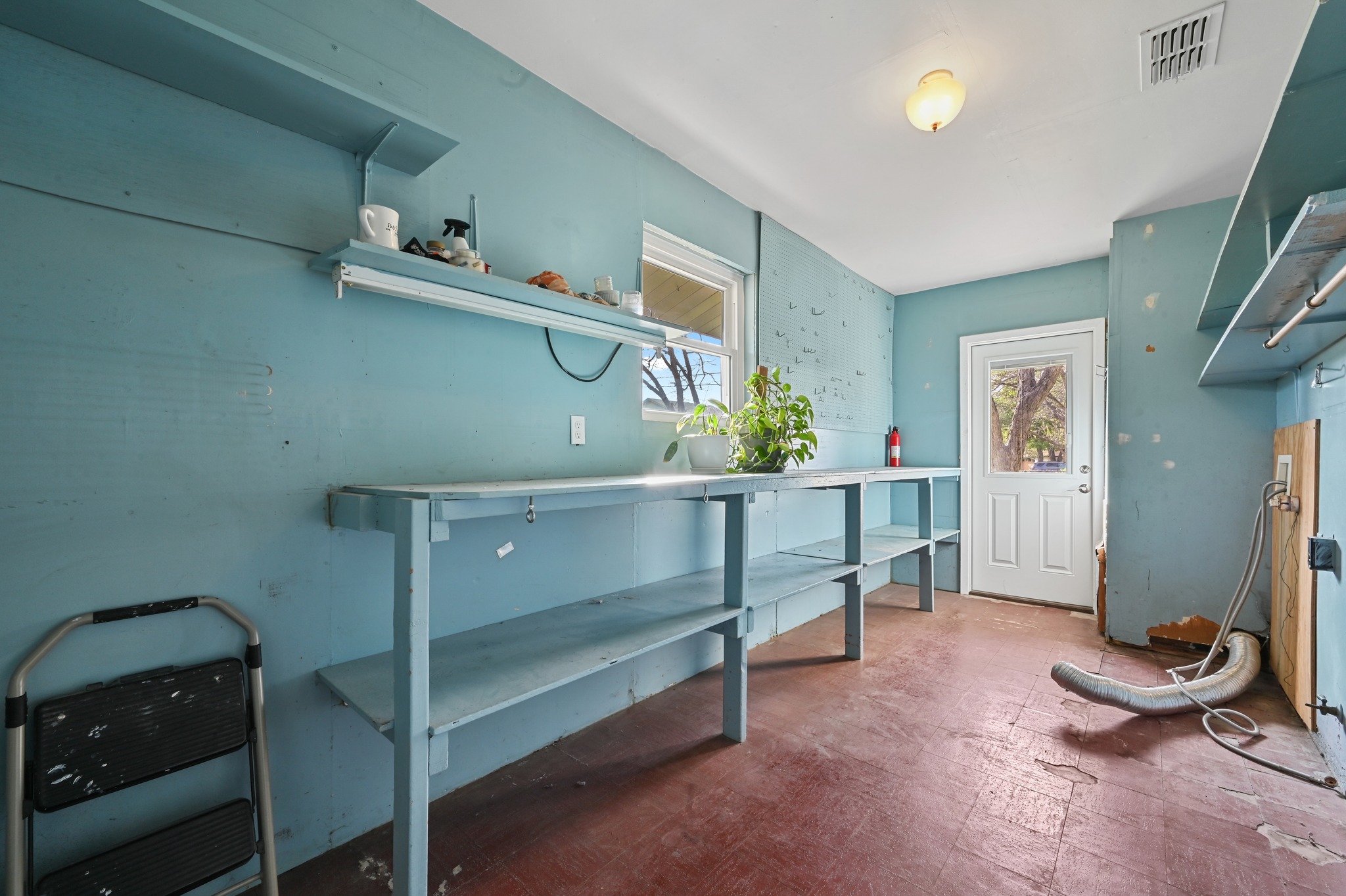 5301 Buffalo Pass Austin, TX 78745 - Photo 20 of 23 LARGE laundry storage area w/backyard access