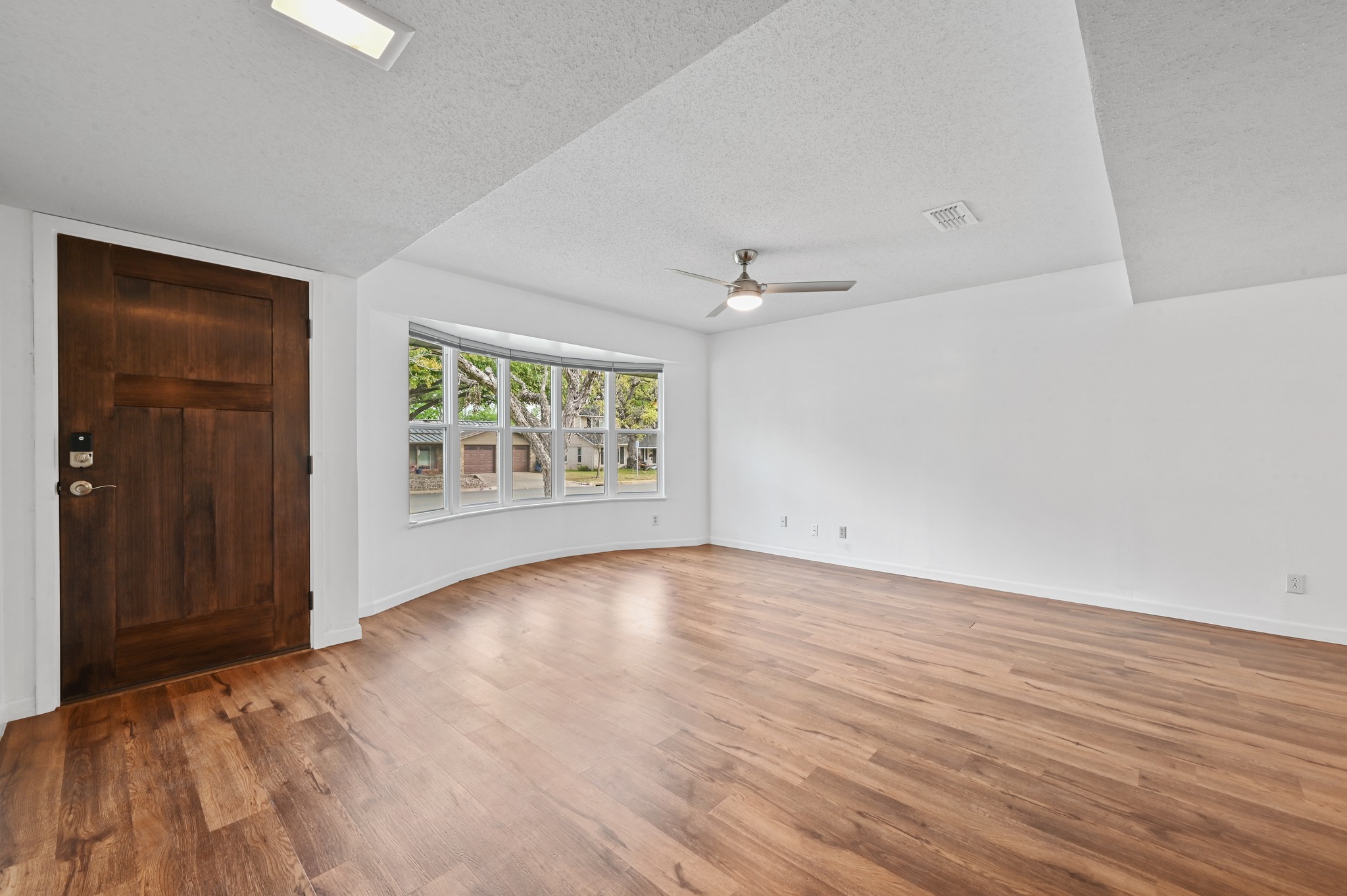 5301 Buffalo Pass Austin, TX 78745 - Photo 4 of 23 Entrance foyer to main living area