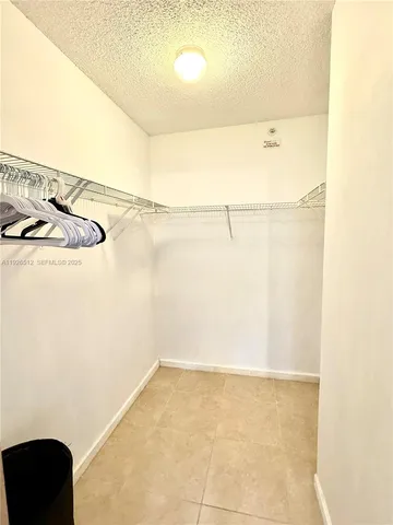 a view of hallway with natural light