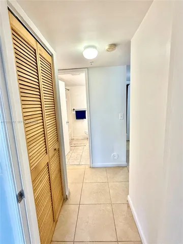 a bathroom with a sink toilet a mirror and shower