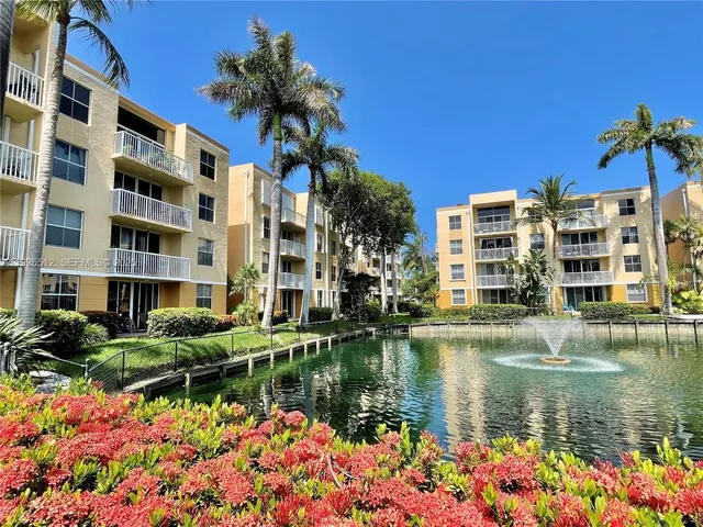 a view of swimming pool with outdoor seating and yard