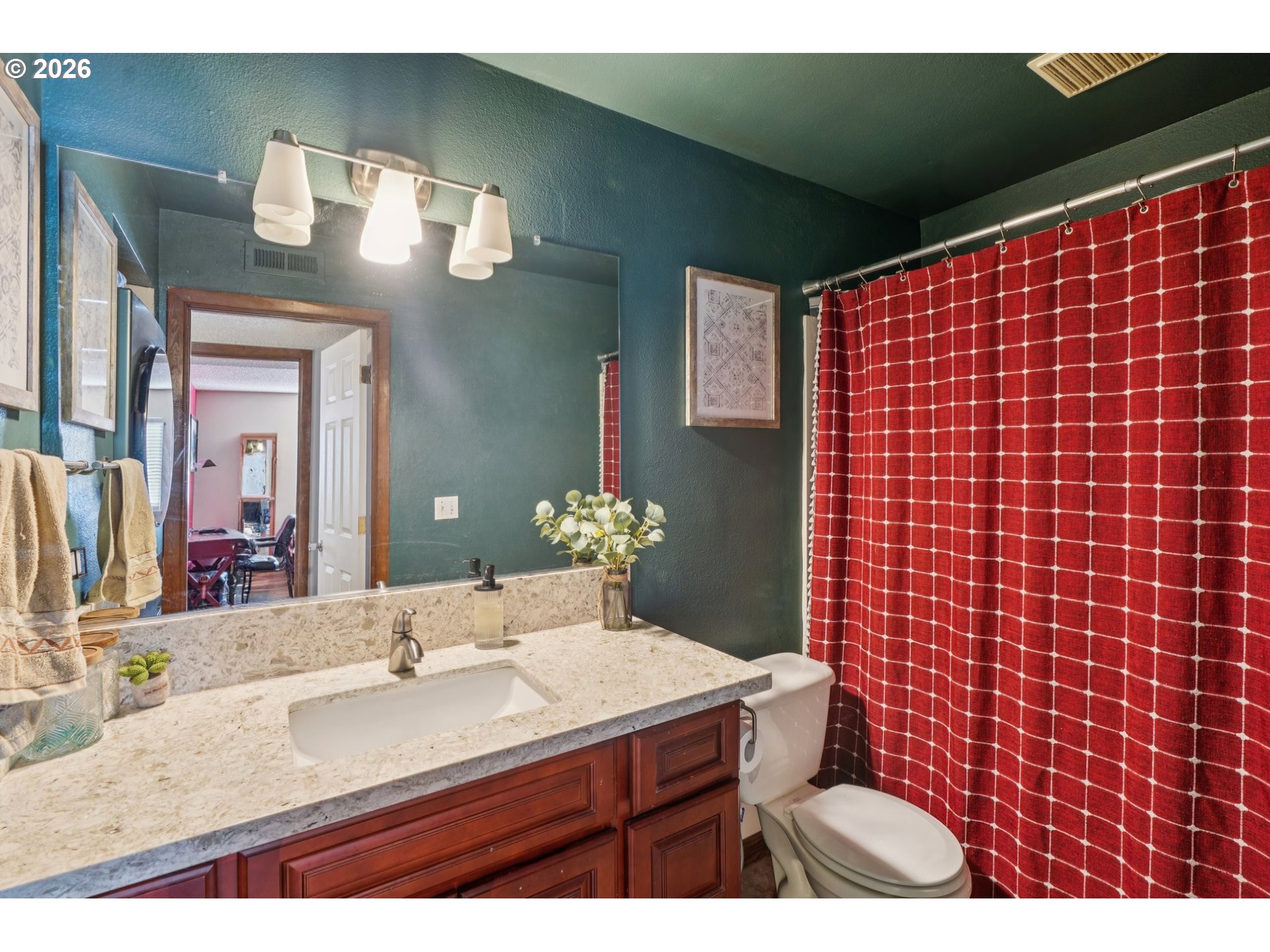 3383 Northeast 162nd Avenue Portland, OR 97230 - Photo 12 of 27 a bathroom with a sink and a mirror