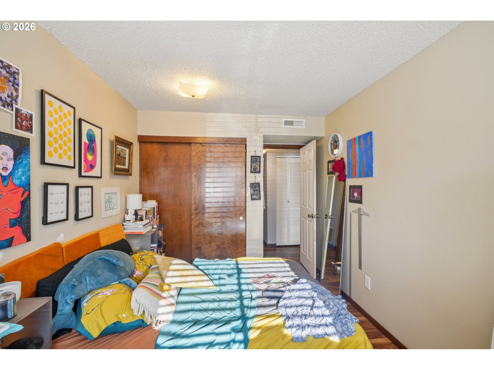 3383 Northeast 162nd Avenue Portland, OR 97230 - Photo 13 of 27 a bedroom with a bed and dresser