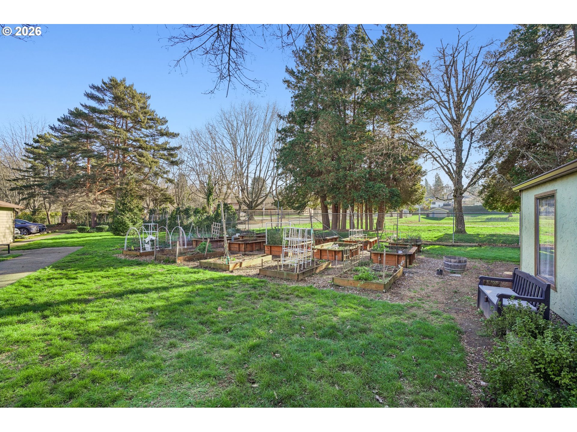 3383 Northeast 162nd Avenue Portland, OR 97230 - Photo 19 of 27 a view of a park with bench and trees