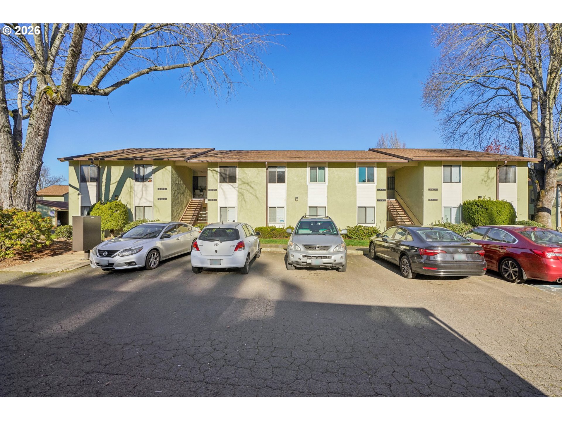 3383 Northeast 162nd Avenue Portland, OR 97230 - Photo 2 of 27 a view of a cars park in front of a building
