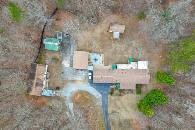 a view of a car parked in front of a building