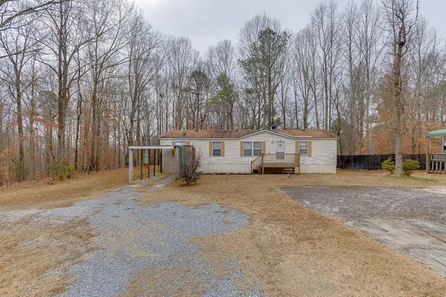a view of a dinning table and chairs in the patio