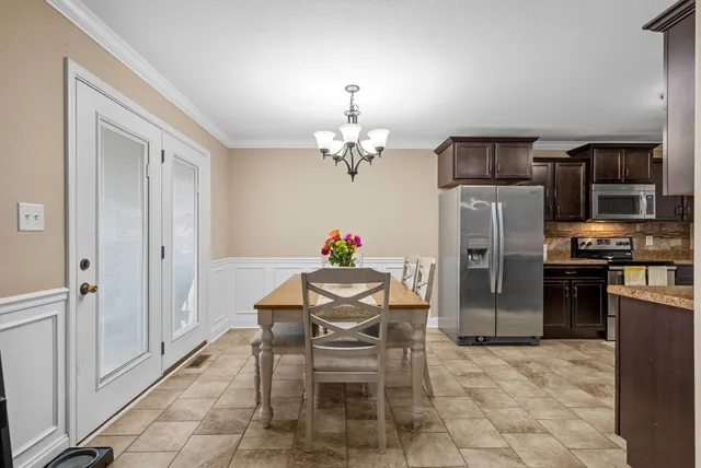 a dining room well furnished