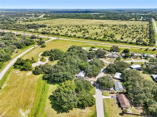 a view of a lake with a yard