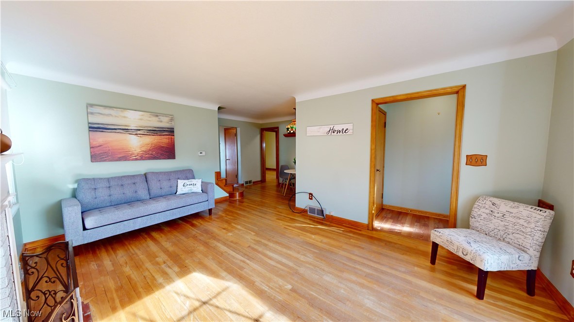 22581 Chardon Road Euclid, OH 44117 - Photo 5 of 34 Living room with light hardwood / wood-style flooring