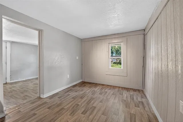 a kitchen with granite countertop a stove and a sink