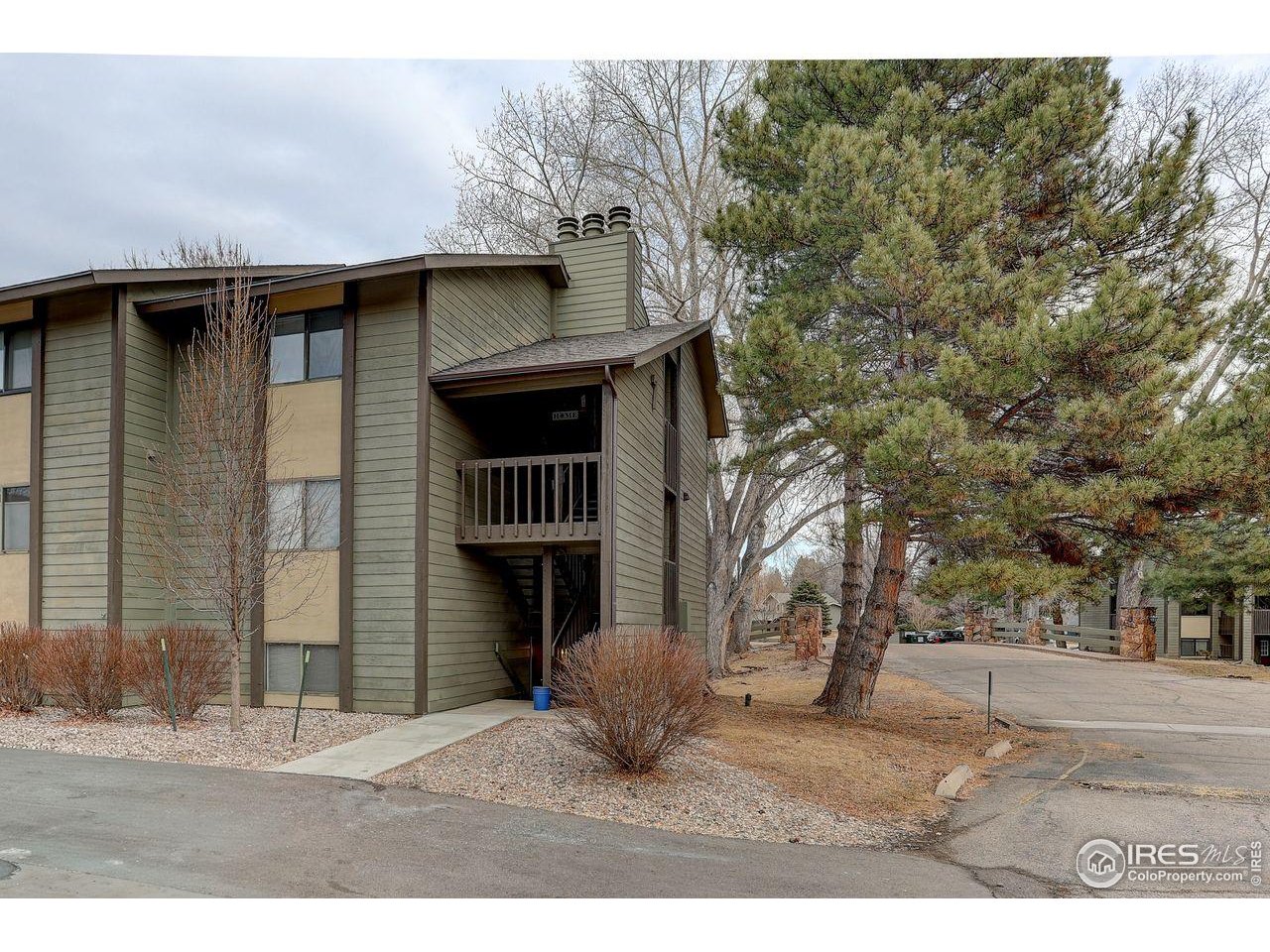 925 Columbia Road, Unit 716 Fort Collins, CO 80525 - Photo 16 of 17 a view of outdoor space yard and front view of a house