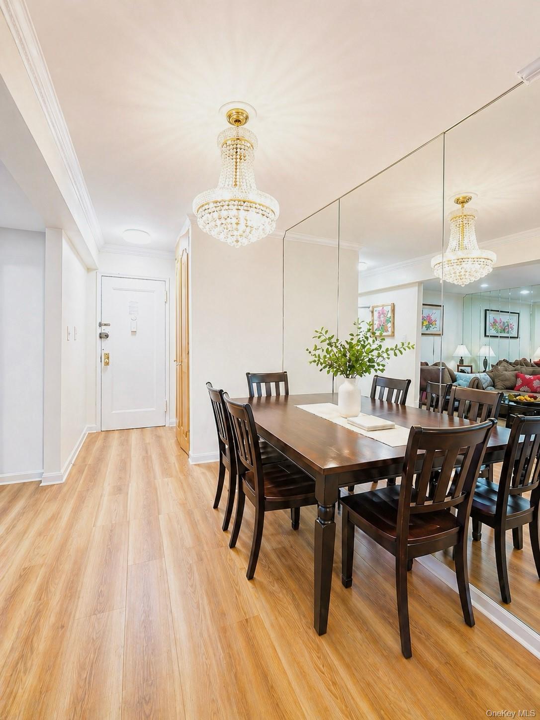 139-16 28th Road, Unit Z Queens, NY 11354 - Photo 9 of 14 a view of a dining room with furniture and wooden floor