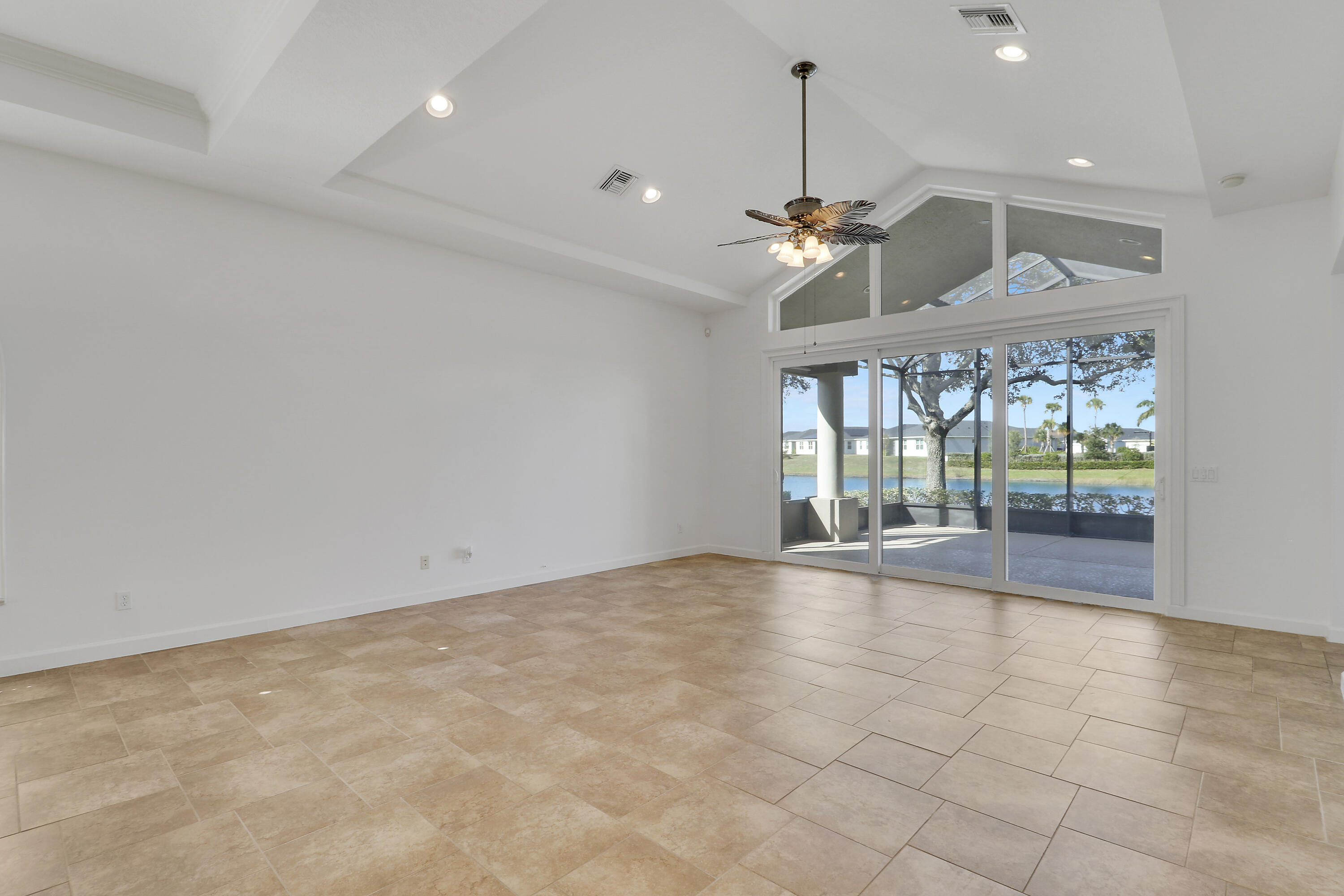9212 Short Chip Circle Port St. Lucie, FL 34986 - Photo 17 of 71 a view of an empty room with a window