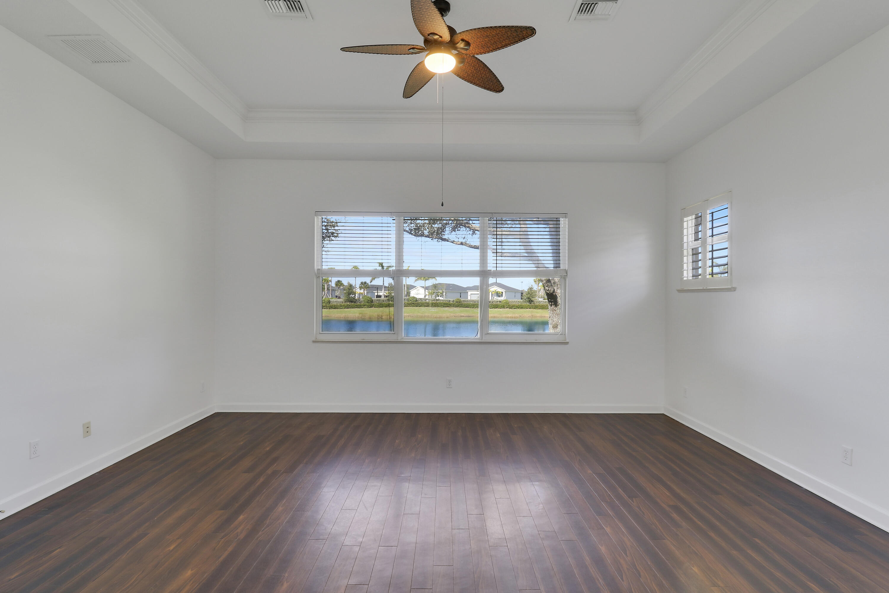 9212 Short Chip Circle Port St. Lucie, FL 34986 - Photo 26 of 71 a view of room with hardwood floor and window