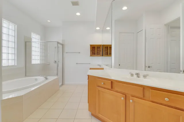 a workspace with furniture and a potted plant