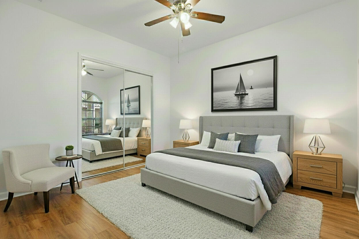 9212 Short Chip Circle Port St. Lucie, FL 34986 - Photo 34 of 71 a bedroom with a bed and a couch