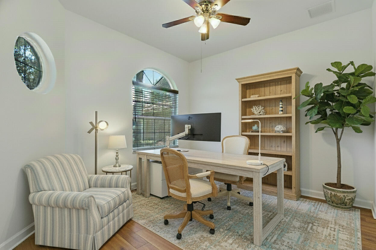 9212 Short Chip Circle Port St. Lucie, FL 34986 - Photo 38 of 71 a workspace with furniture and a potted plant