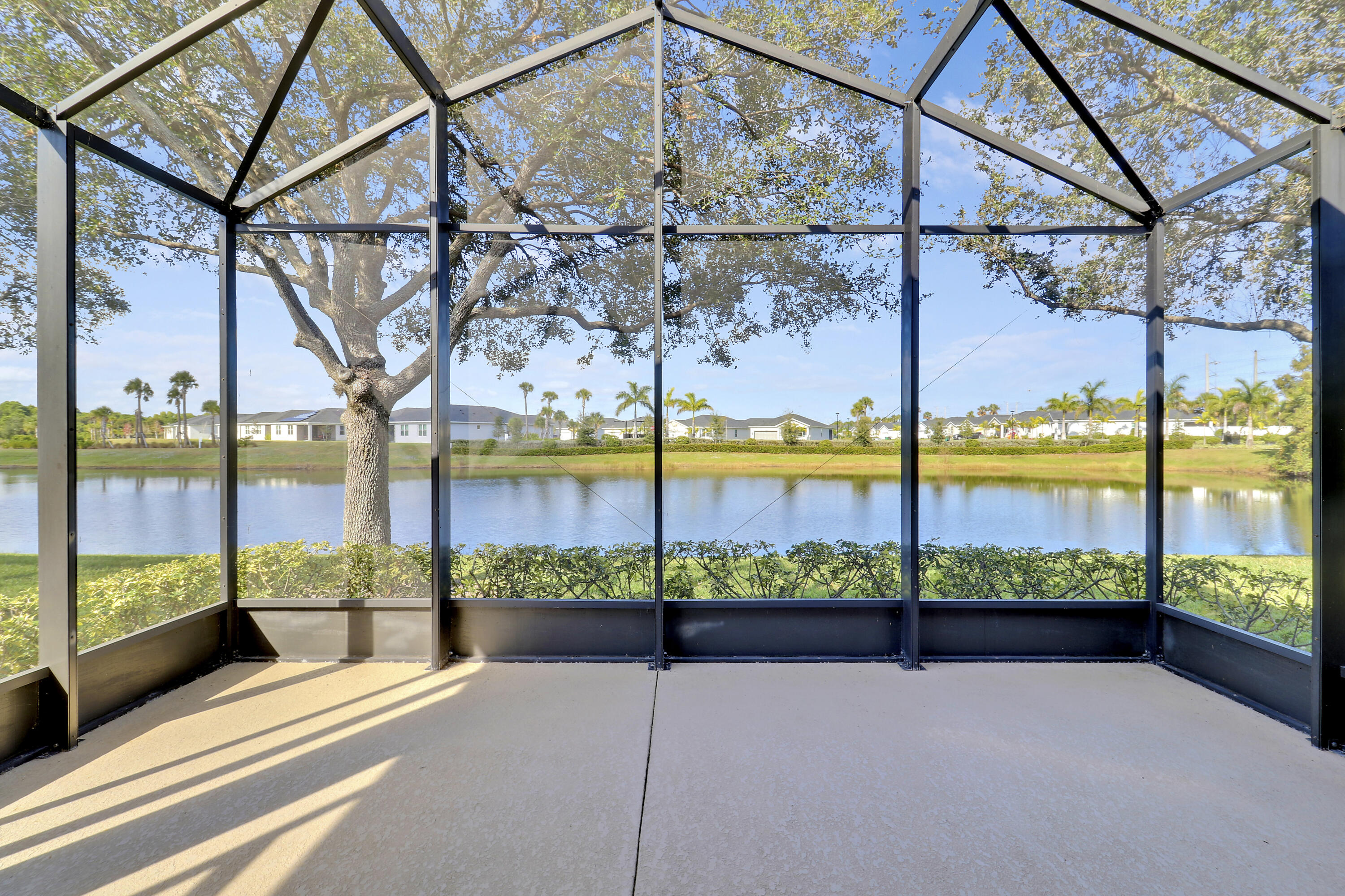 9212 Short Chip Circle Port St. Lucie, FL 34986 - Photo 4 of 71 Screened & Covered Patio