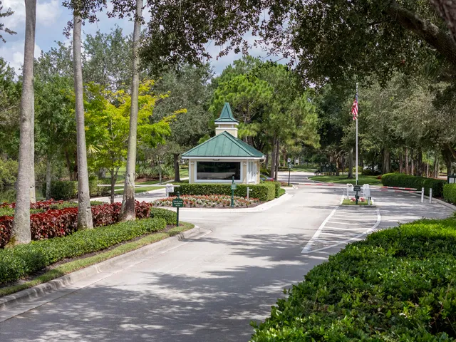 a view of a dining room with furniture and window