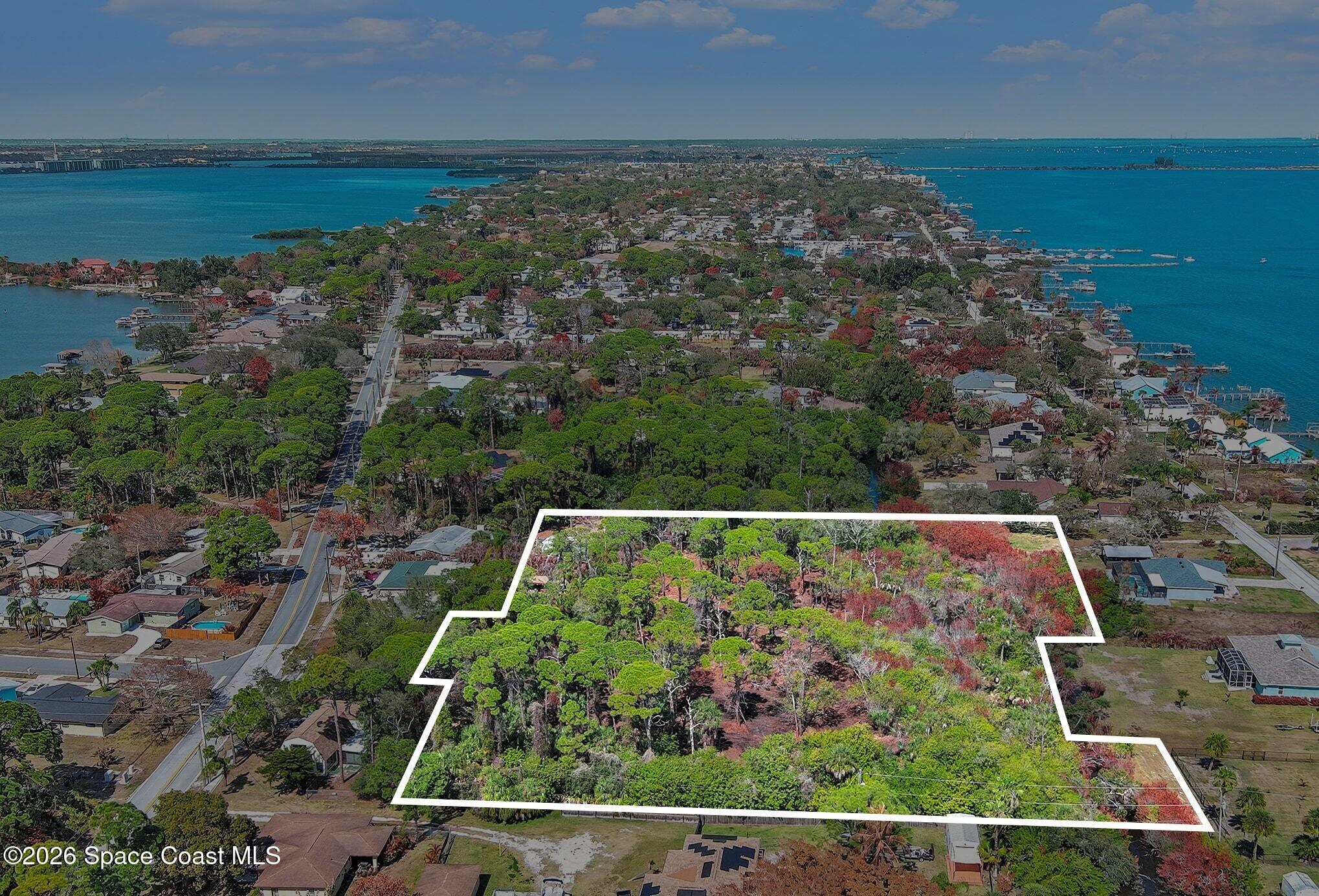 0 Via Roma Merritt Island, FL 32952 - Photo 4 of 21 an aerial view of ocean with residential house