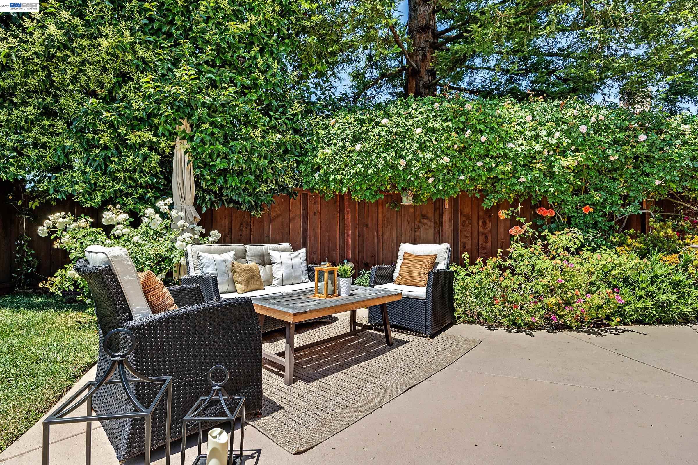 17 Suva Court San Ramon, CA 94582 - Photo 33 of 47 a backyard of a house with outdoor seating