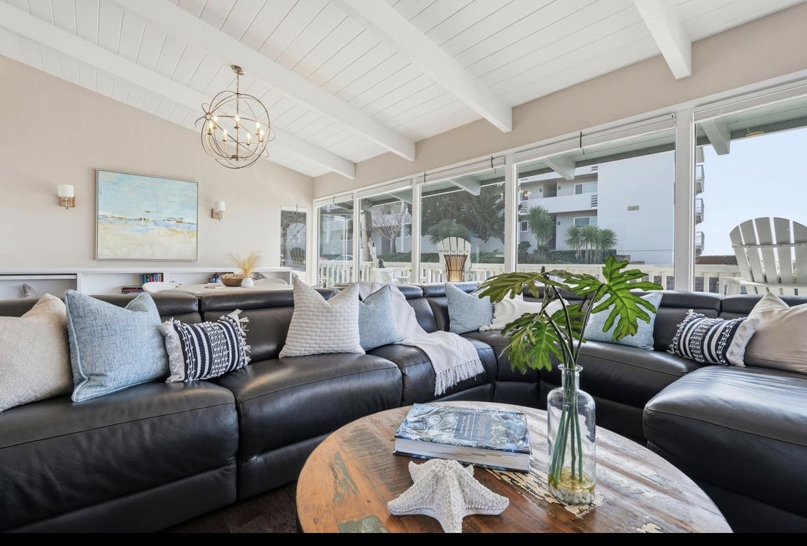 229 Rio Del Mar Boulevard Aptos, CA 95003 - Photo 3 of 27 a living room with furniture kitchen view and a large window