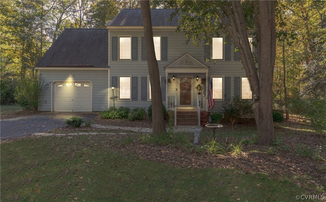 13816 Laurel Spring Road Chester, VA 23831 - Photo 29 of 31 a backyard of a house with lots of green space