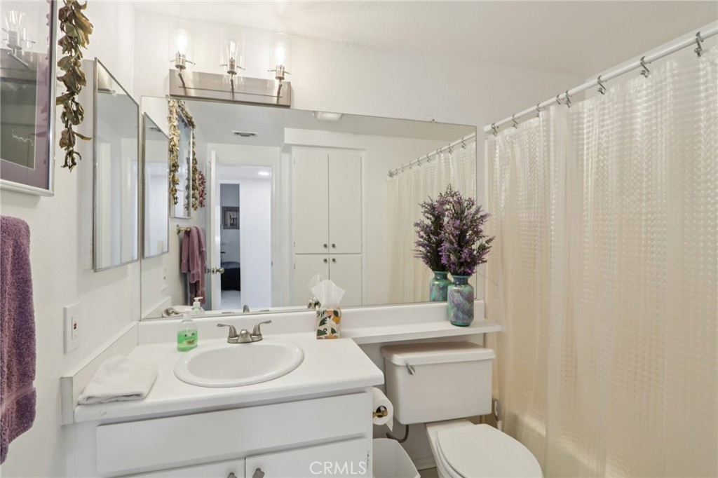 23605 Del Monte Dr., Unit 252 Valencia, CA 91355 - Photo 16 of 48 a bathroom with a sink toilet and shower